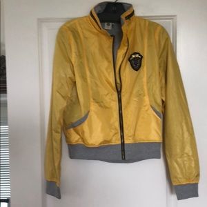 Yellow windbreaker. . Brand new